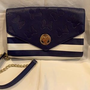 Disney Boutique purse. Gold chain strap w navy leather shoulder piece